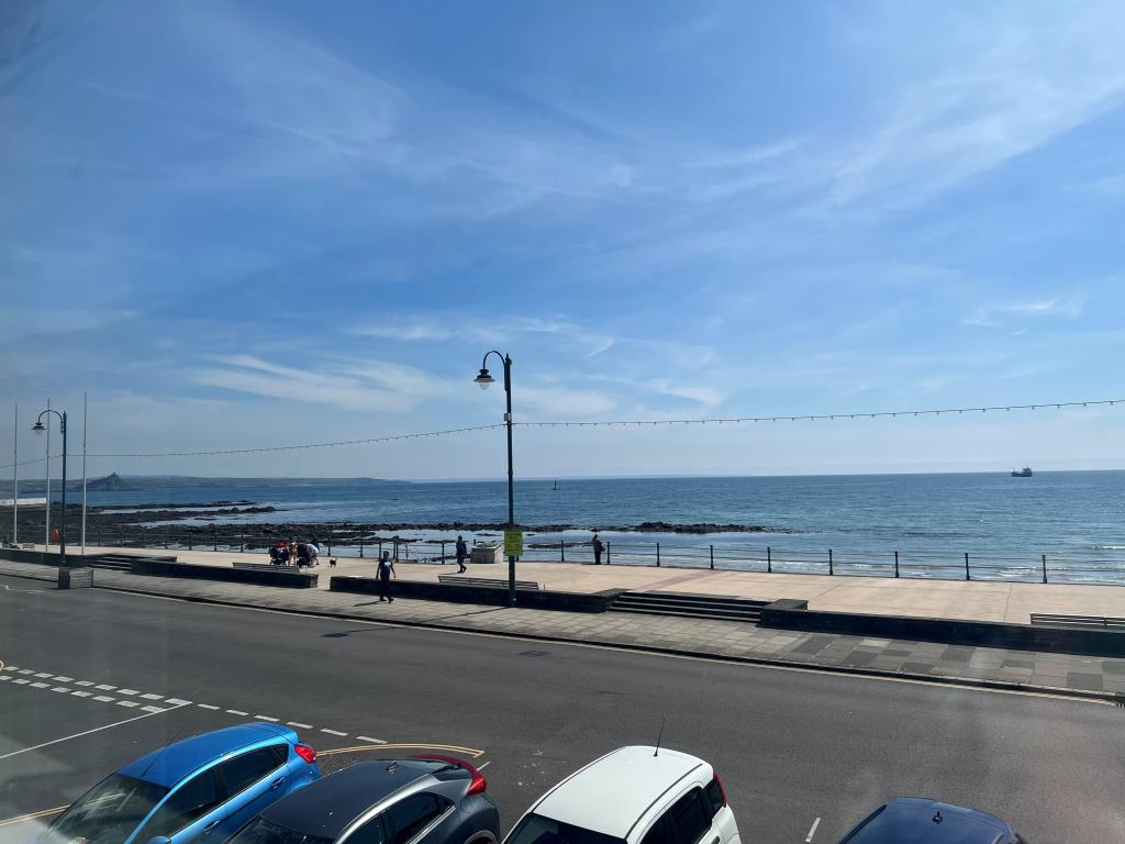 Lot: 144 - COMMERCIAL PROPERTY WITH THREE SELF-CONTAINED LETTING UNITS ENJOYING SEA VIEWS - View from Zelah's bedroom looking over Mounts Bay and towards St Michaels Mount